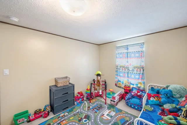 a bed room with furniture and a bed