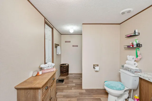 a children room with furniture and toys