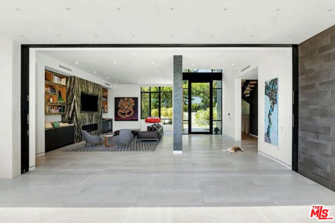 Undisclosed Address Beverly Hills, CA 90210 - Photo 17 of 47 a living room with furniture