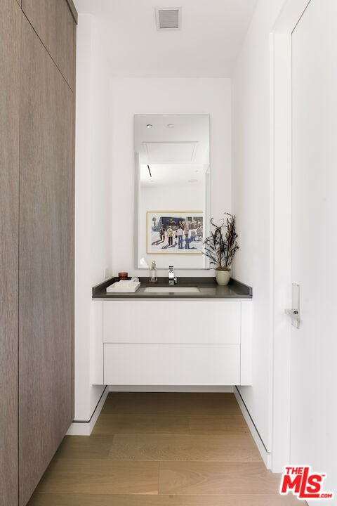 Undisclosed Address Beverly Hills, CA 90210 - Photo 47 of 47 a bathroom with a sink and a mirror