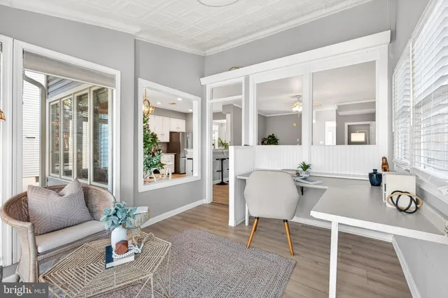 a view of balcony with wooden floor