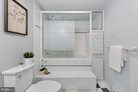 a bathroom with a sink and toilet