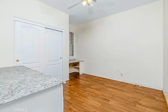a view of a storage & utility room with a sink