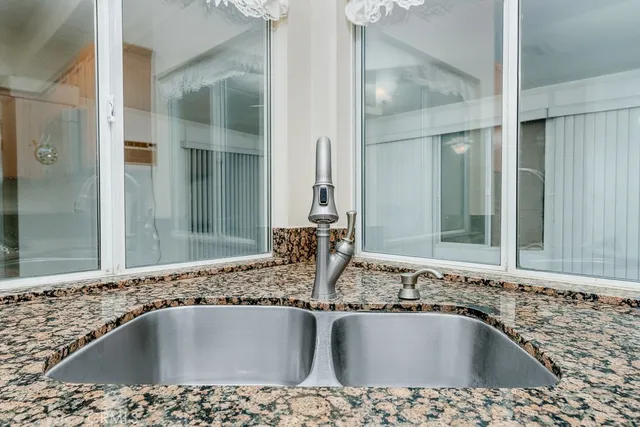 a bathroom with a bathtub and a sink
