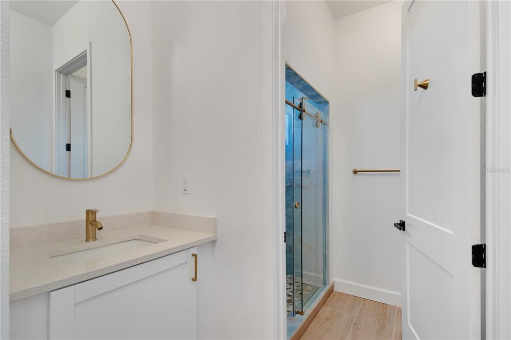 4869 Northwest 101st St Road Ocala, FL 34482 - Photo 28 of 48 dual vanities guest bathroom