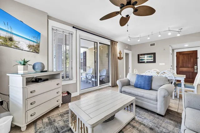 a view of a room with a large window