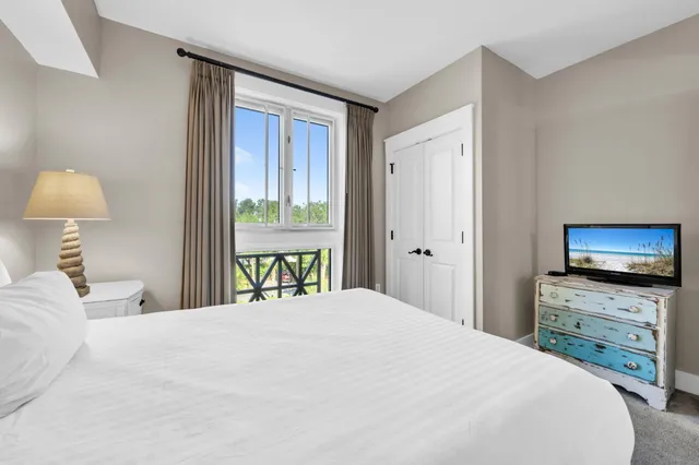 a bathroom with a toilet a sink and a mirror