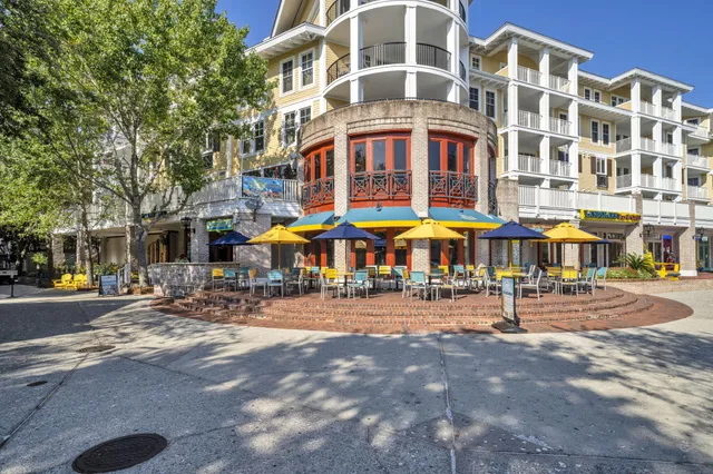 a view of a park with sitting area