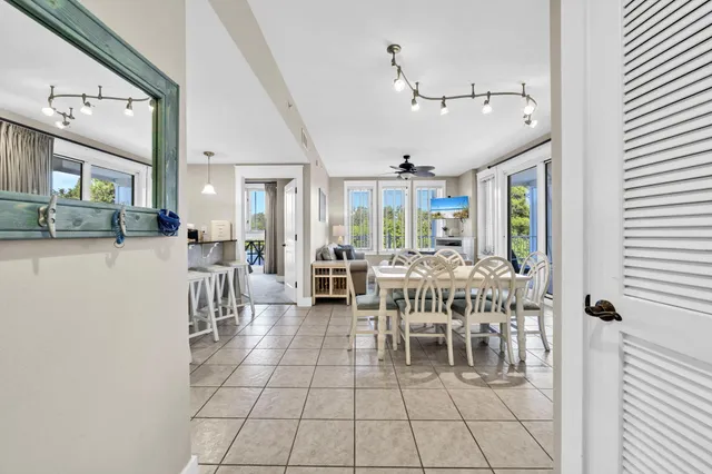 a kitchen with a sink and refrigerator