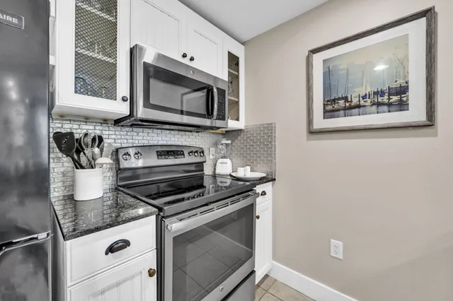 a view of a dining room kitchen and a window