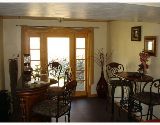 1051 Sugar Hollow Road Apollo, PA 15613 - Photo 2 of 8 Den/Family/Great Room. Stunning bar / entertainment area with rich wood bar, table and stools. Anderson Atrium door leads to the private back yard.