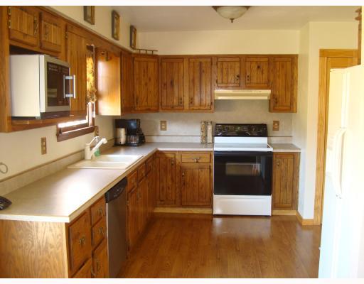 1051 Sugar Hollow Road Apollo, PA 15613 - Photo 4 of 8 Kitchen. Large country kitchen with lots of counter space and wood flooring. All applicances included!