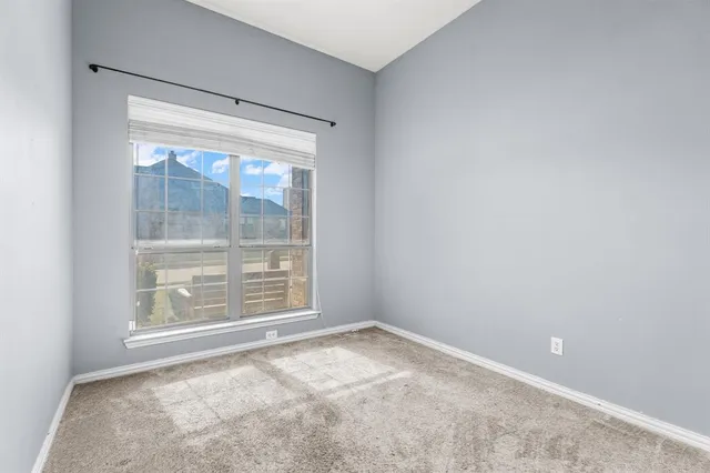 a bathroom with a sink toilet and a mirror