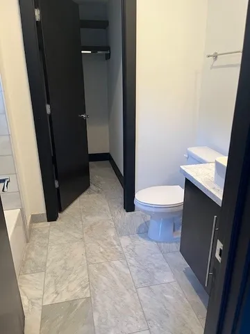 a bathroom with a sink and a toilet
