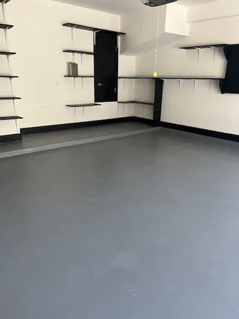 a view of a bedroom with bed and a window