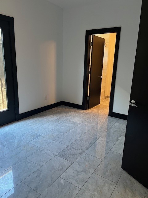 1255 Utah Street Houston, TX 77007 - Photo 9 of 17 a view of an empty room with a window