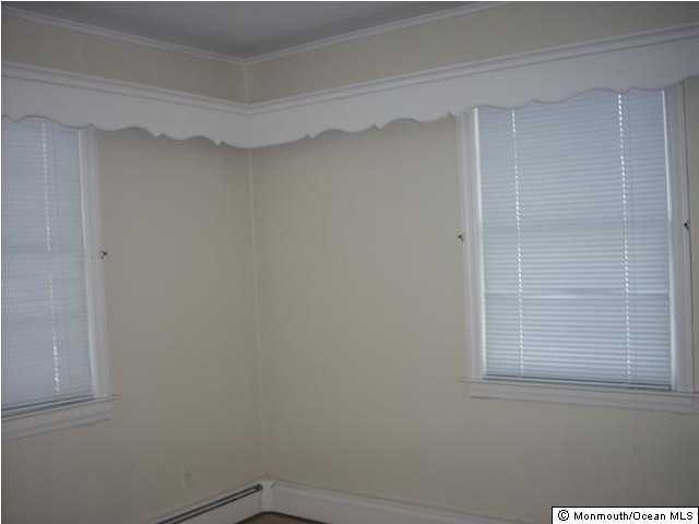 323 Sudbury Road Point Pleasant, NJ 08742 - Photo 3 of 3 a view of a door and a window