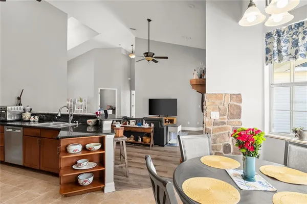 a view of a hallway with seating area