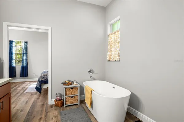 a workspace with furniture and a window