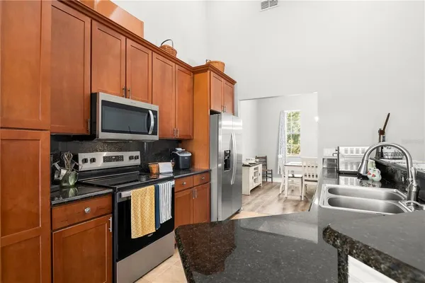 a view of a dining room with furniture window and outside view