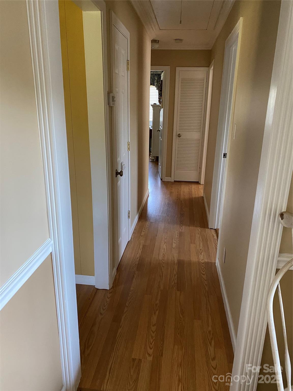 9525 Mull Road Vale, NC 28168 - Photo 16 of 36 a view of a hallway with wooden floor and staircase