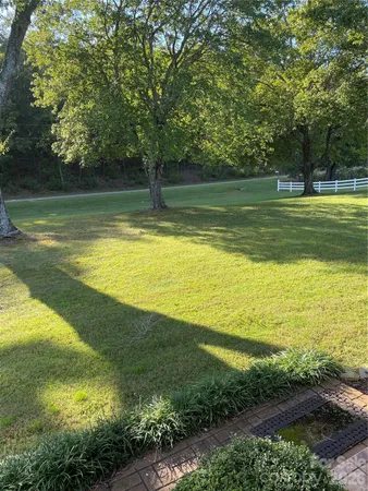 a view of a lake view with a big yard