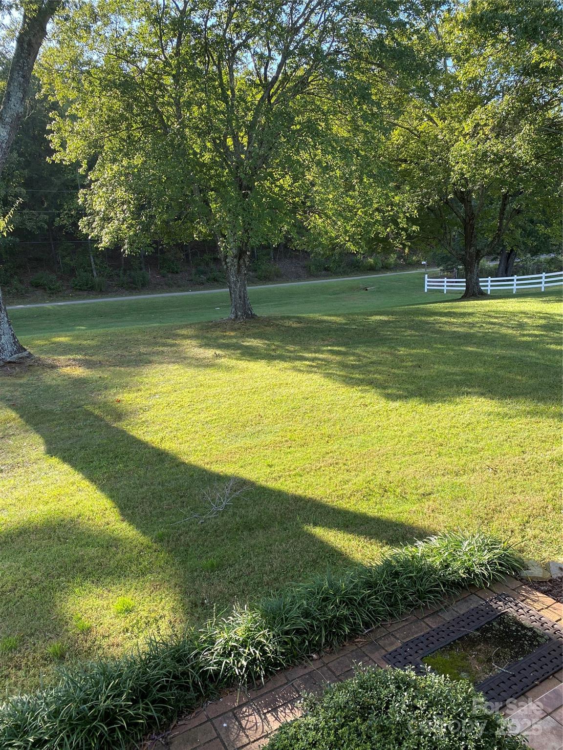 9525 Mull Road Vale, NC 28168 - Photo 22 of 36 a view of a lake with a big yard
