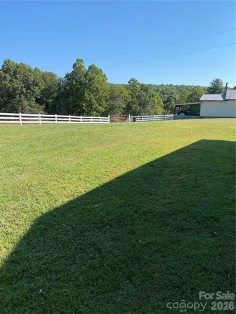 a view of a barn with a yard