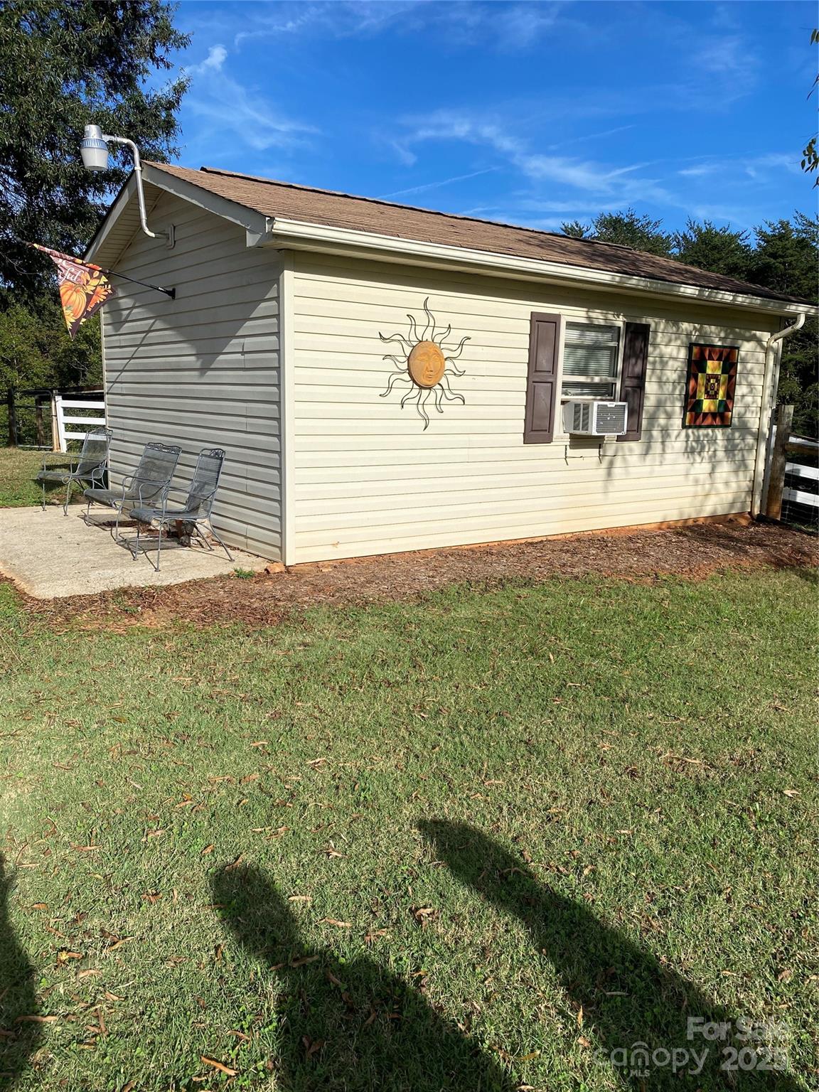 9525 Mull Road Vale, NC 28168 - Photo 27 of 36 a view of house with backyard and outdoor space