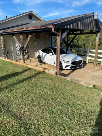 an outdoor space with patio furniture and a fireplace