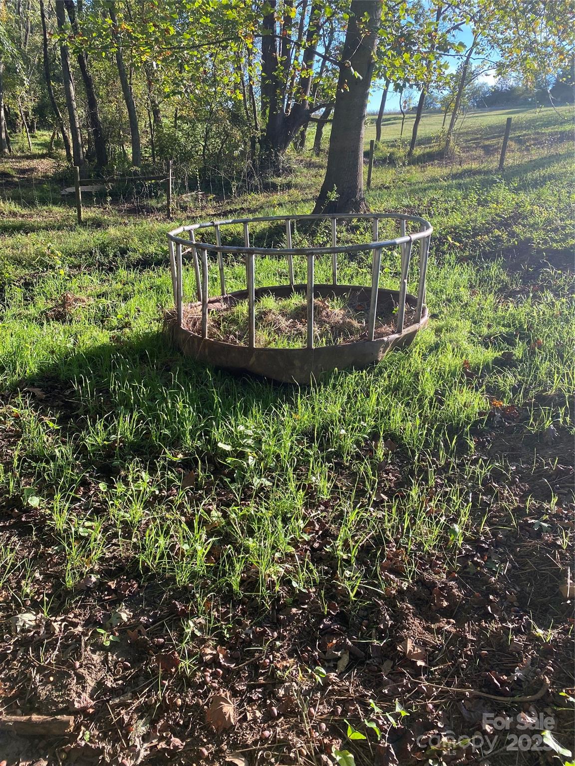 9525 Mull Road Vale, NC 28168 - Photo 36 of 36 a view of a garden with a bench