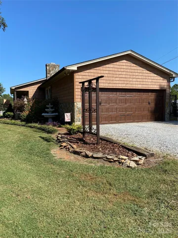 a front view of house with yard