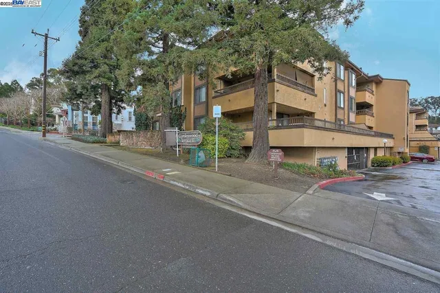 a view of a building with a swimming pool