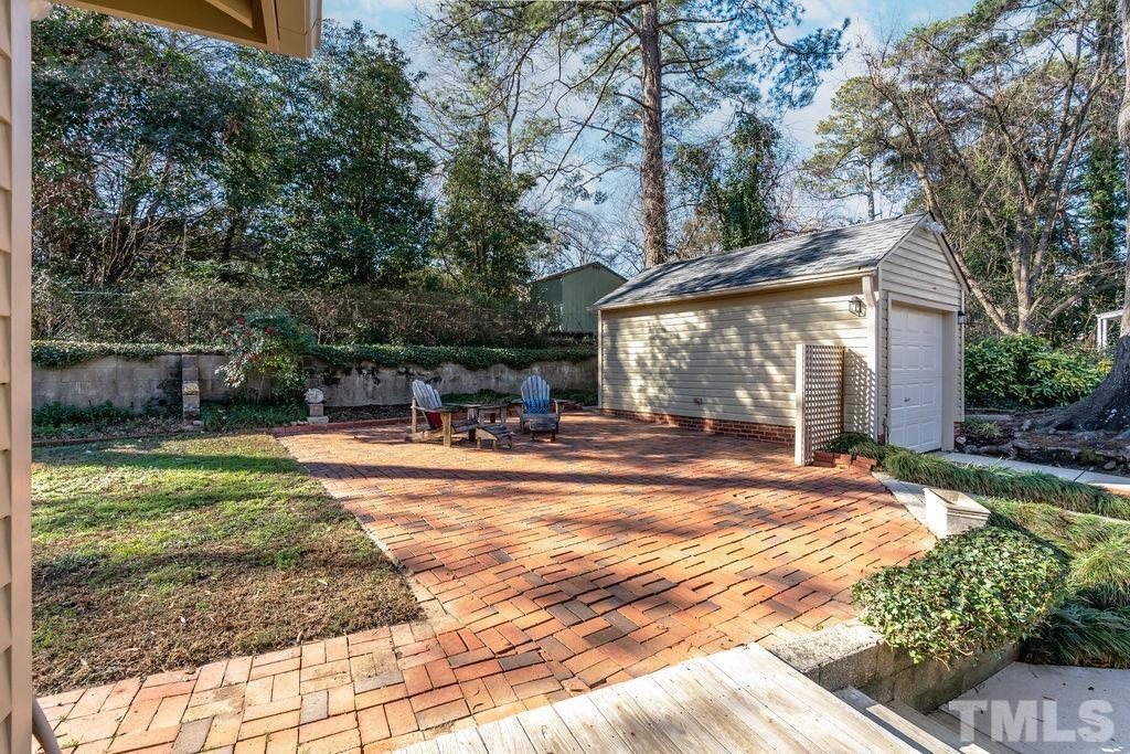 3203 Bedford Avenue Raleigh, NC 27607 - Photo 14 of 20 a view of a house with backyard and sitting area