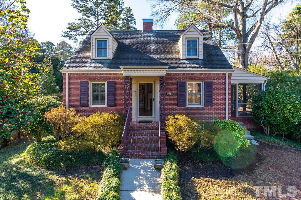 3203 Bedford Avenue Raleigh, NC 27607 - Photo 2 of 20 a front view of a house with garden