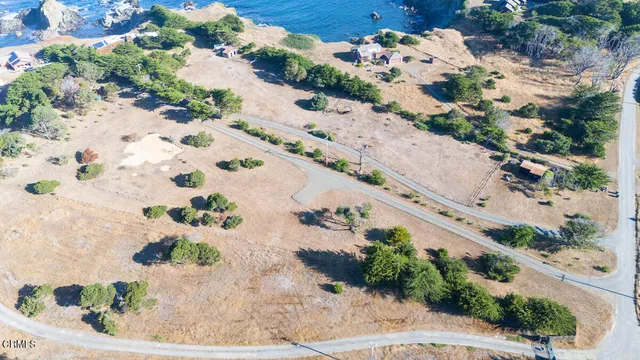 a view of beach and yard