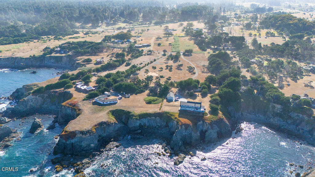 45370 Caspar Point Road Caspar, CA 95420 - Photo 6 of 25 a view of a backyard of a house with a yard