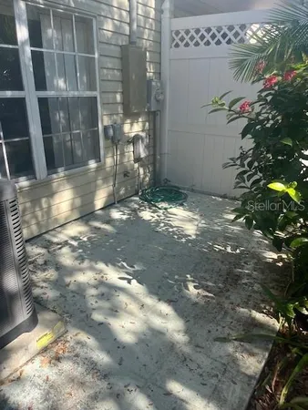 a view of backyard of a house