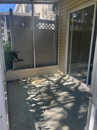 a view of swimming pool with a garden and trees