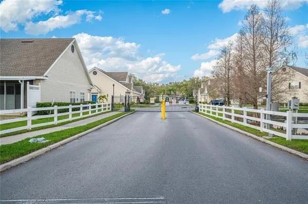 a view of a patio with swimming pool