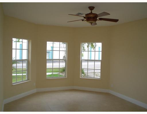 910 Phippen Waiters Road Dania Beach, FL 33004 - Photo 8 of 16 a view of an empty room with a window