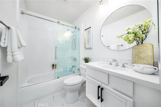 a view of a patio with wooden floor