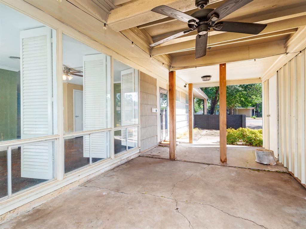 311 Miami Street Coleman, TX 76834 - Photo 28 of 31 a view of a porch with a table and chairs