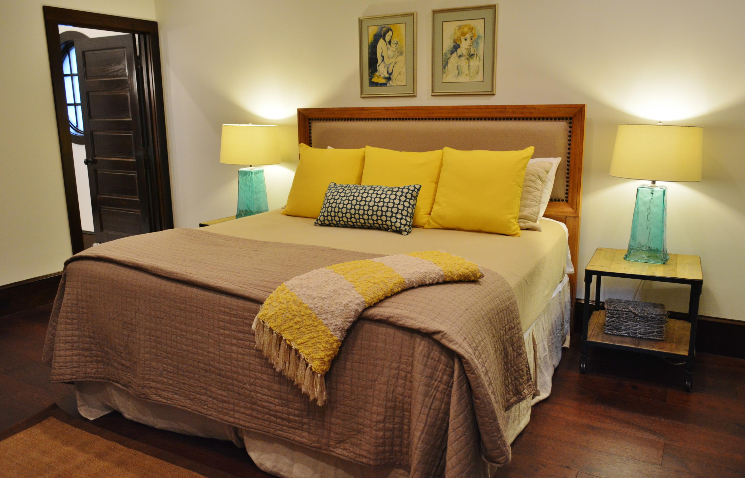 102 Round Road Rosemary Beach, FL 32461 - Photo 15 of 36 a bedroom with a bed and wooden floor