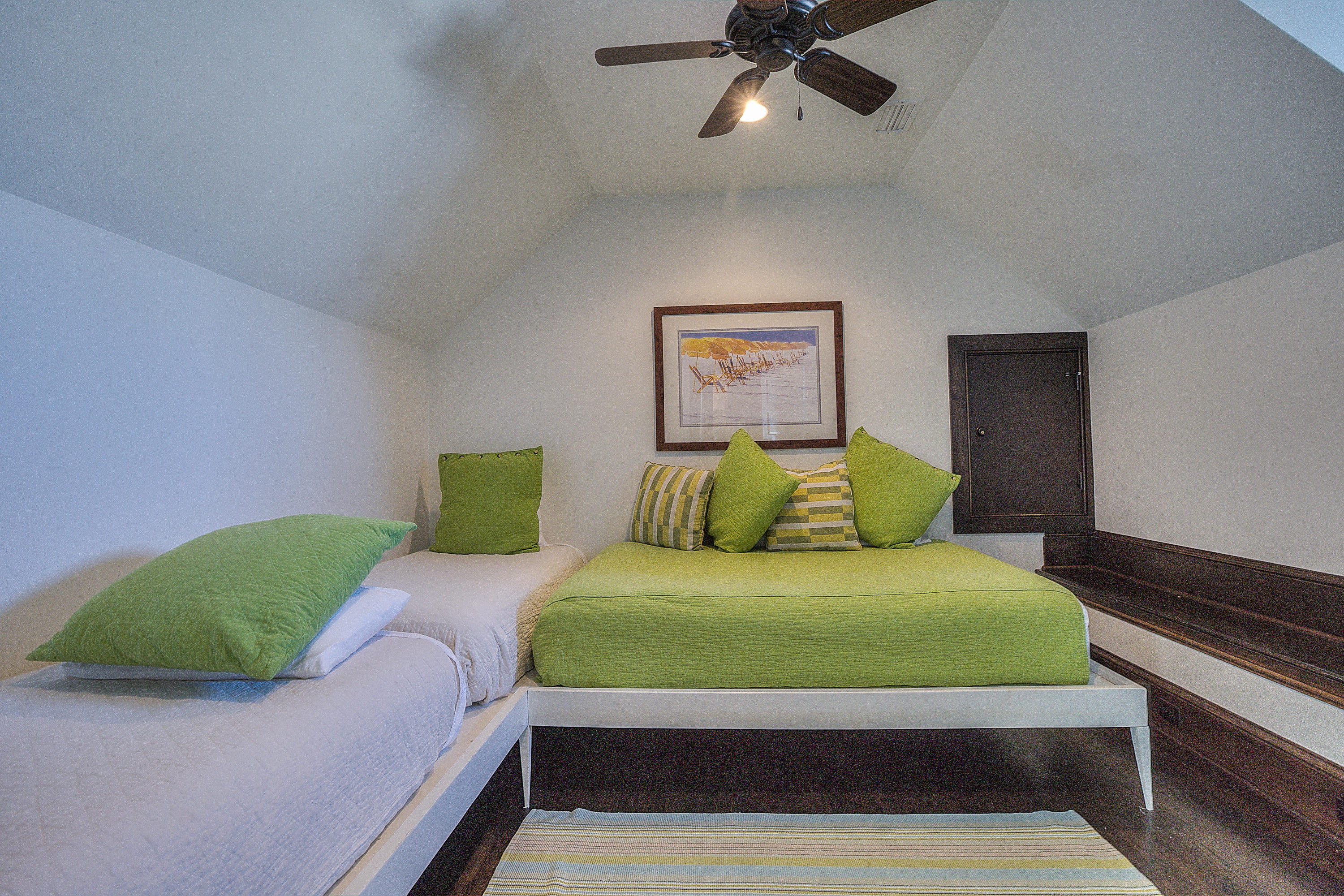 102 Round Road Rosemary Beach, FL 32461 - Photo 20 of 36 a bedroom with a bed and two large window