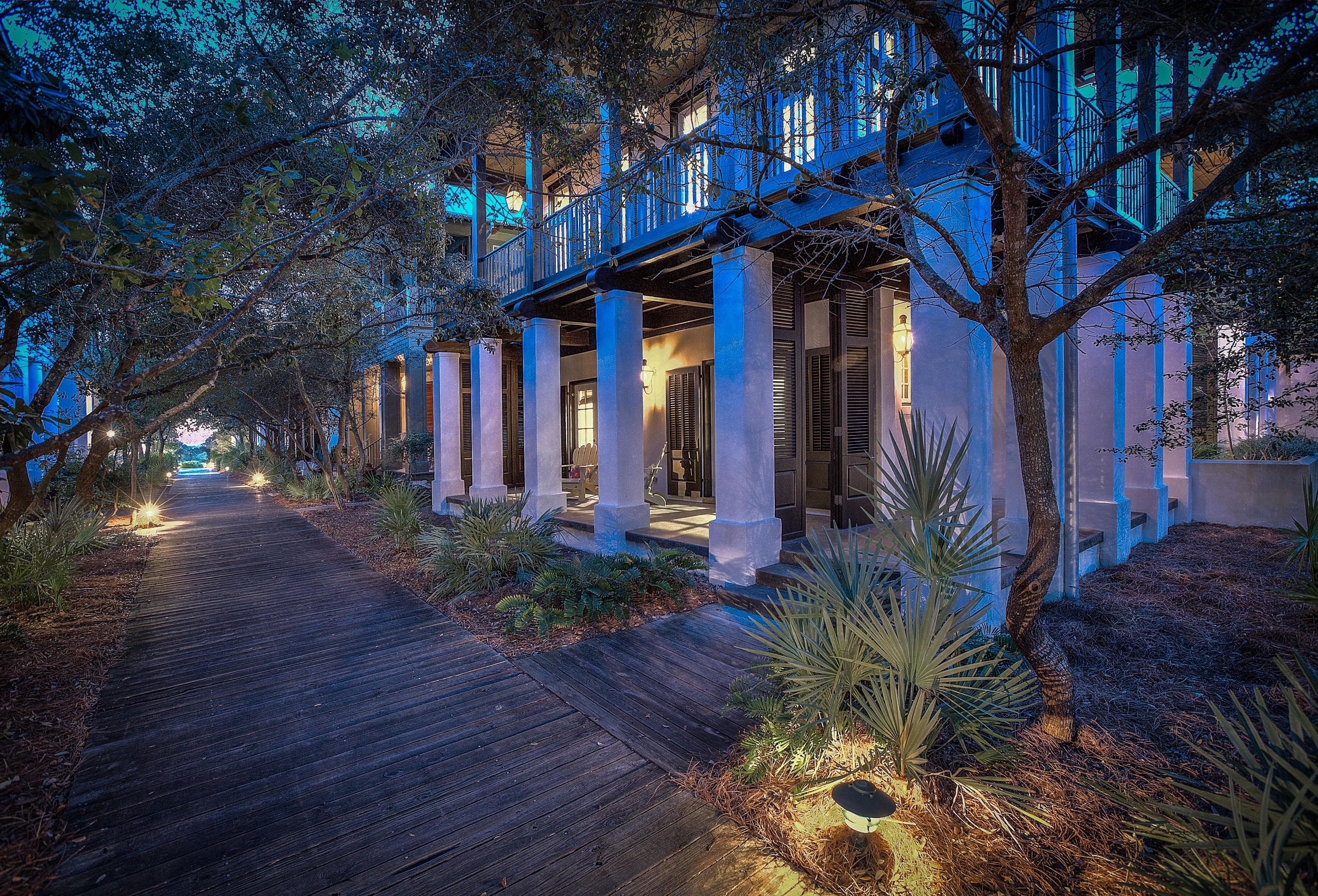 102 Round Road Rosemary Beach, FL 32461 - Photo 23 of 36 a front view of a house with garden