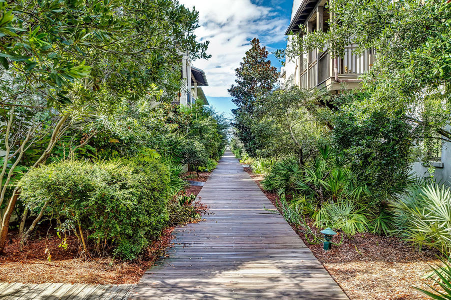 102 Round Road Rosemary Beach, FL 32461 - Photo 32 of 36 a view of a pathway with plants