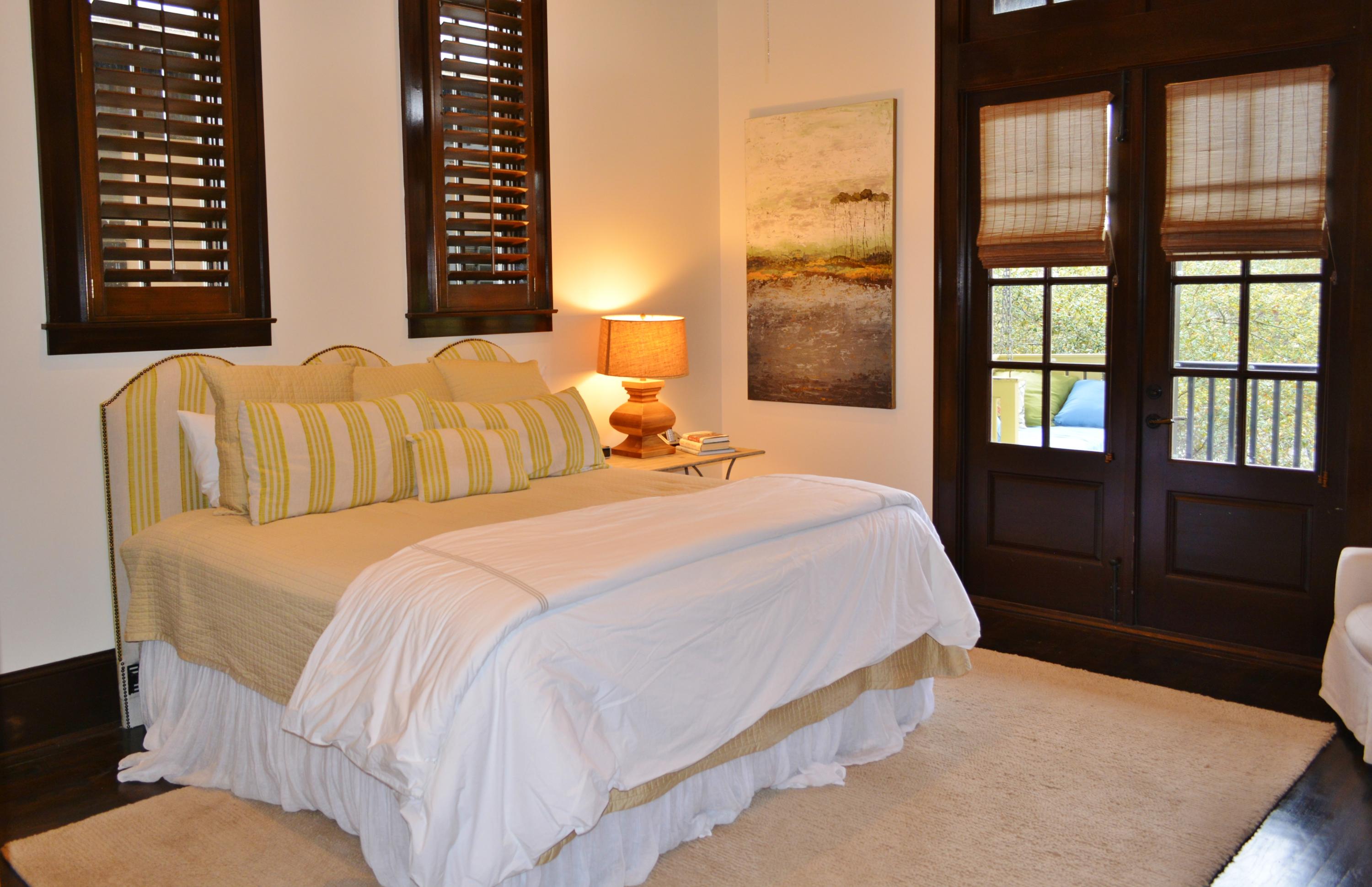 102 Round Road Rosemary Beach, FL 32461 - Photo 9 of 36 a bedroom with bed and a large window