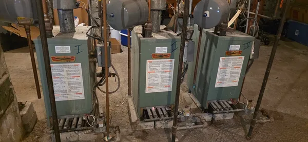 a bathroom with a shower and a sink