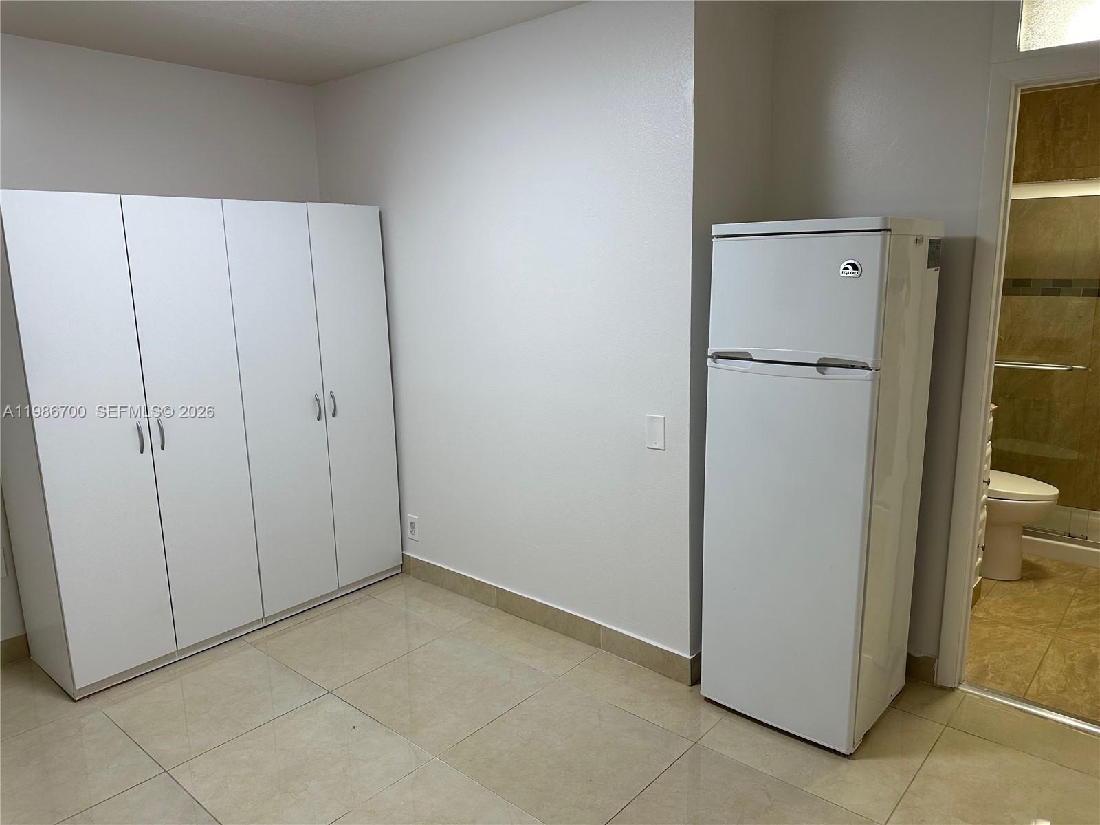 14620 Southwest 151st Terrace Miami, FL 33196 - Photo 13 of 30 a view of an empty room